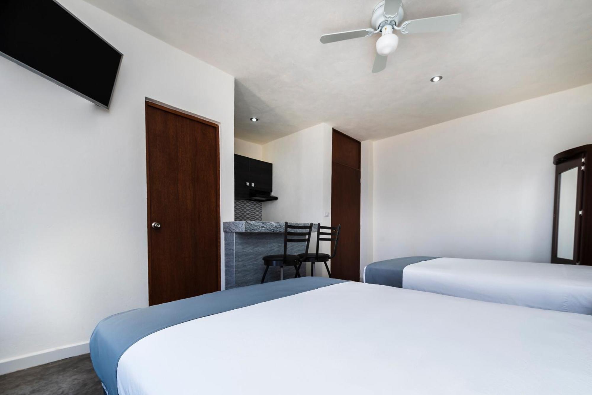 Capital O Hotel Joyma Suites, San Luis Сан-Луис-Потоси Экстерьер фото