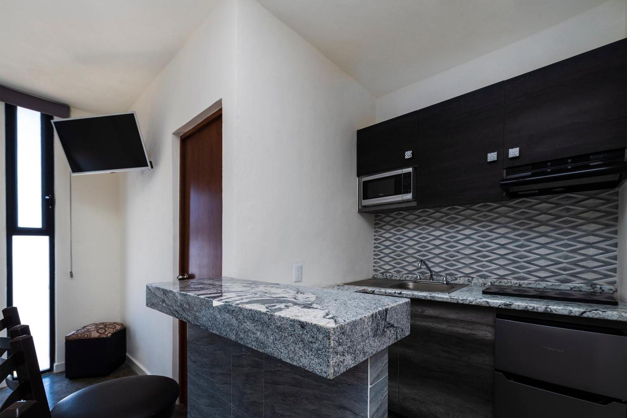 Capital O Hotel Joyma Suites, San Luis Сан-Луис-Потоси Экстерьер фото
